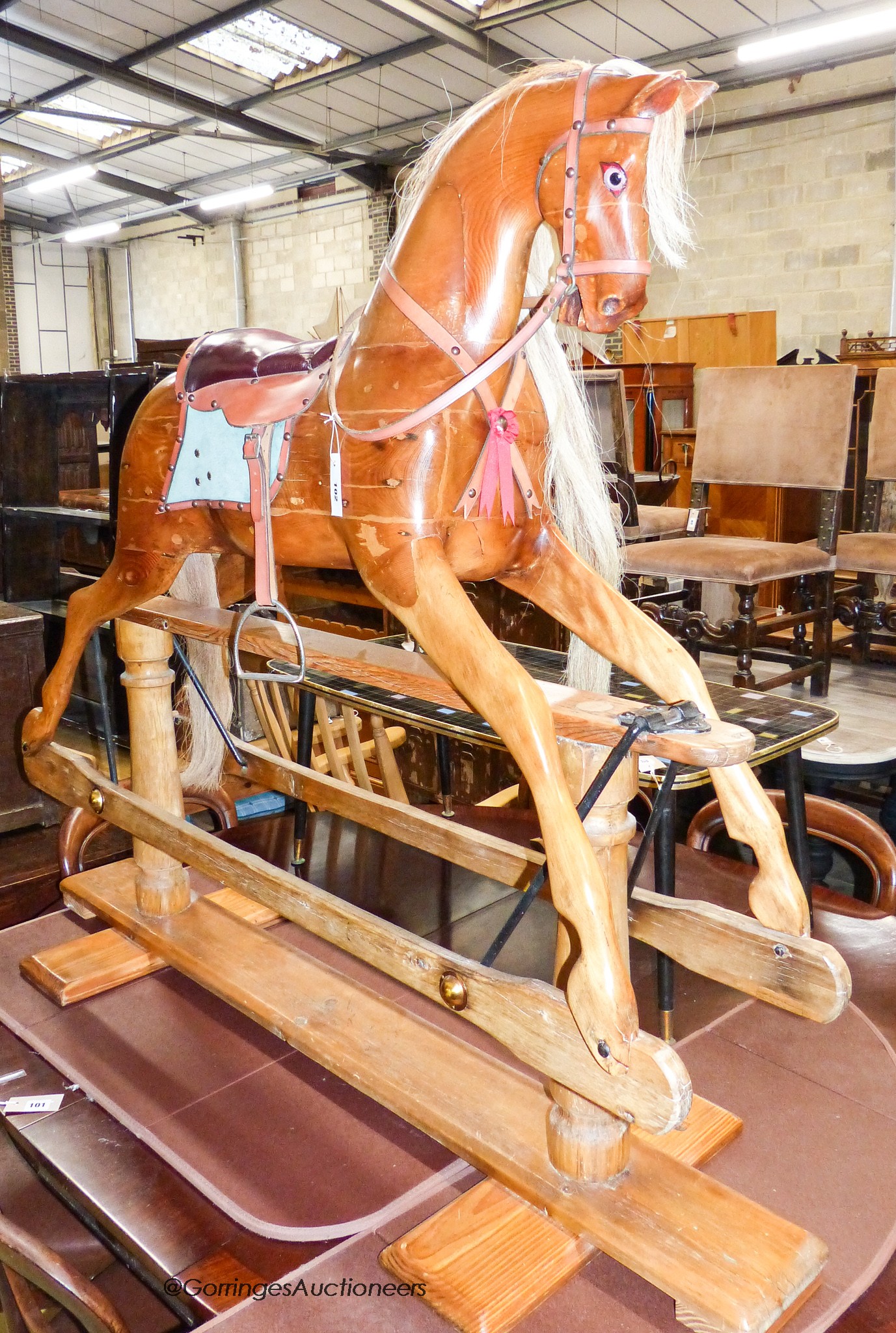 An Edwardian Lines Bros. pine rocking horse, length 144cm, height 126cm